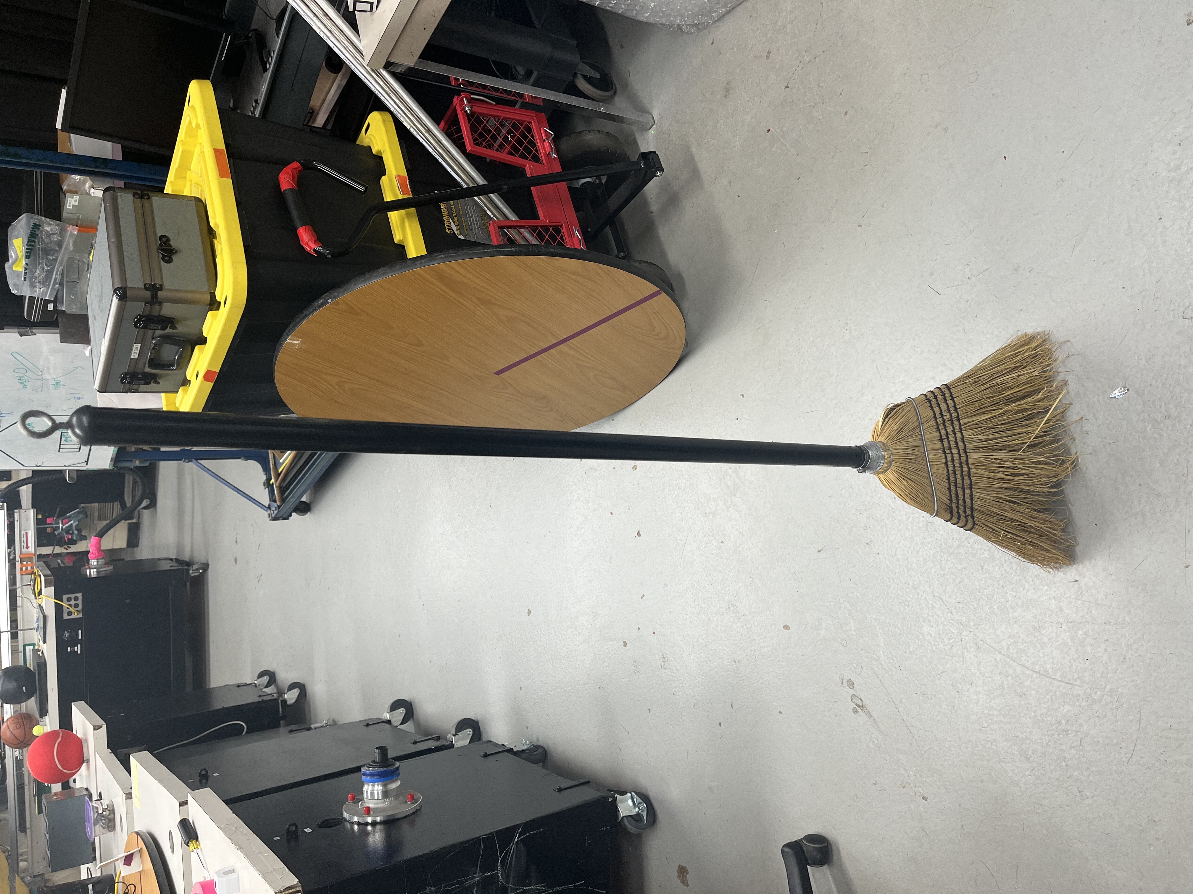 Stand broom upright